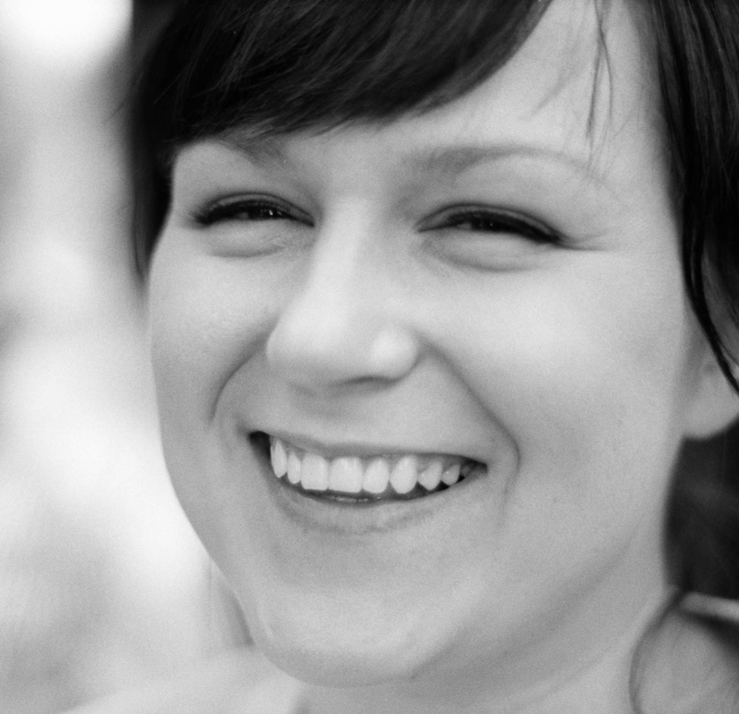 Black and white close-up portrait of Raphaela, founder of The Socratic Lens: Evoking introspection and gentle strength